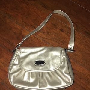 small outside but big inside purse